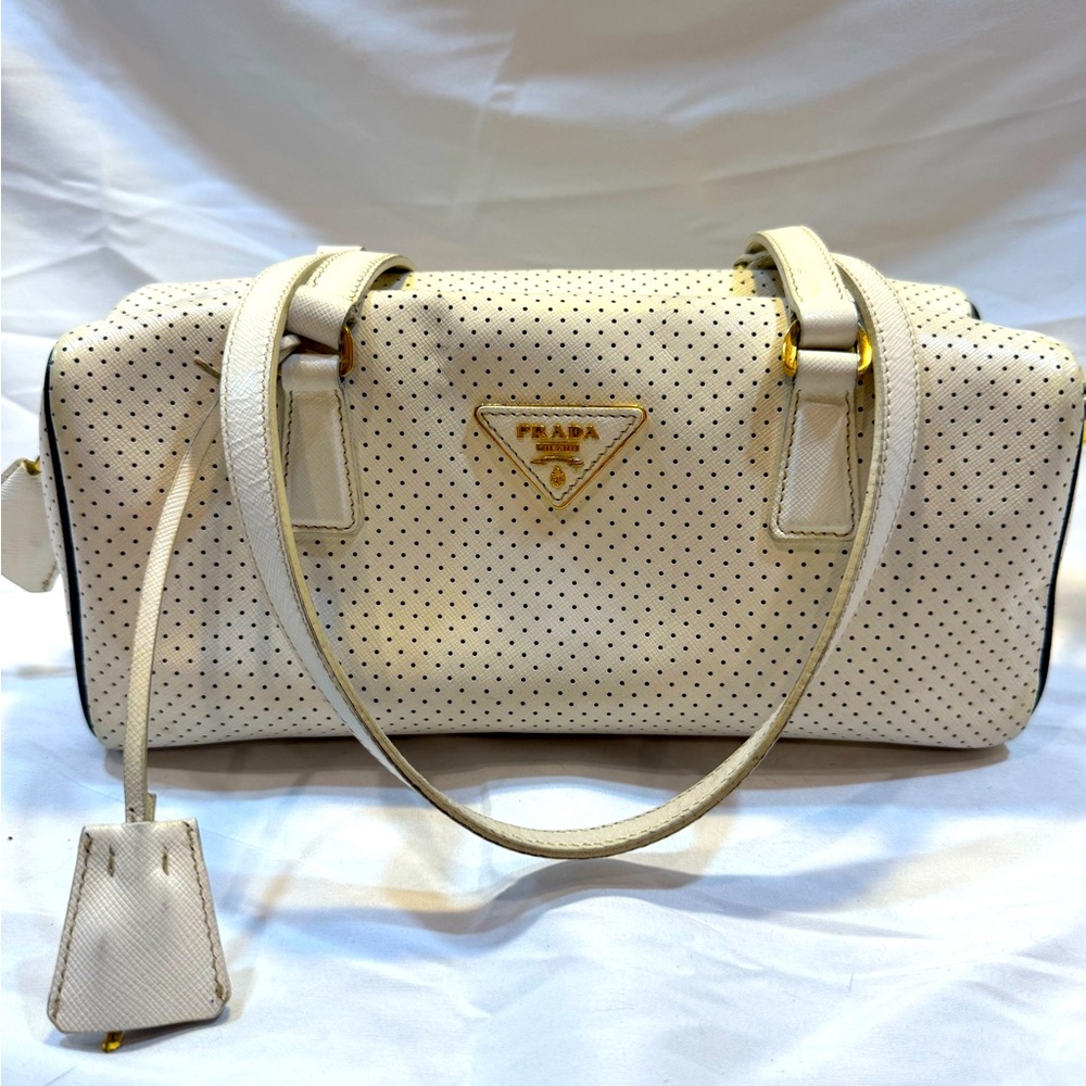 Authentic Prada- bone/white perforated bag!